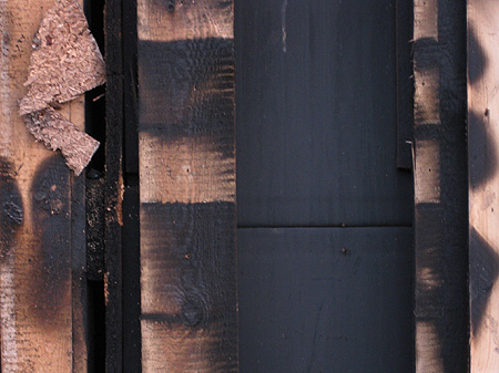 Fotografie Verbranntes Holz